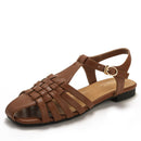 New style woven pig cage openwork sandals, vacation style, fashionable open toe, low heel, flat sole, one-strap Roman sandals 1012-3