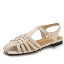 New style woven pig cage openwork sandals, vacation style, fashionable open toe, low heel, flat sole, one-strap Roman sandals 1012-3